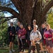 Walking group next to the oak tree