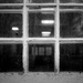 through the window...  darkly...