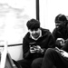 Four boys on a train