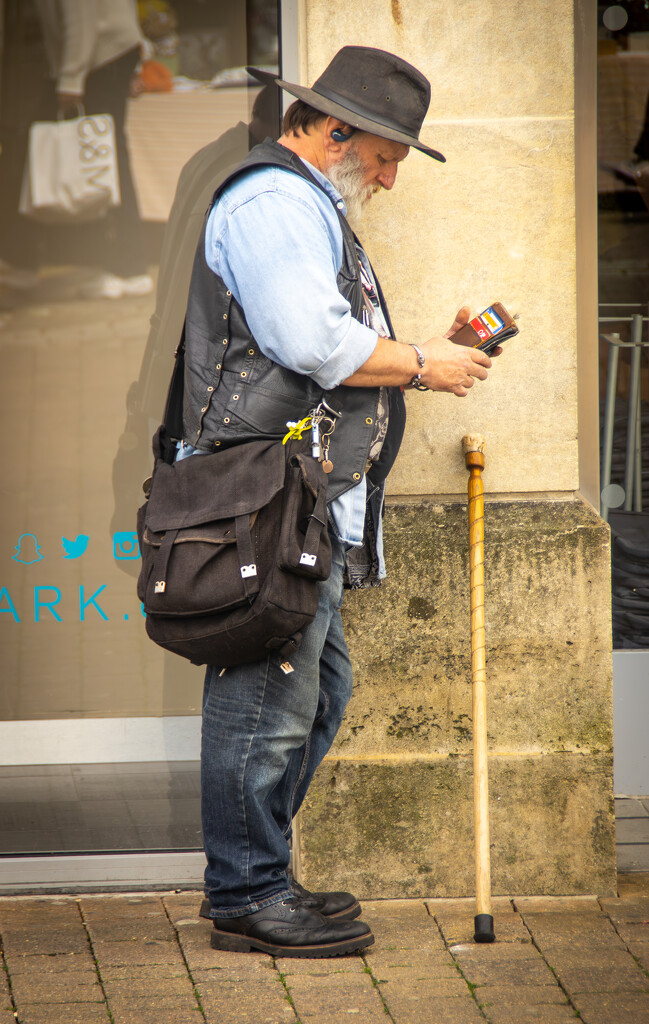 A bored man waiting outside Primark. by swillinbillyflynn