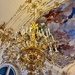 Chandelier and painted ceiling. 