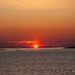 The sun sets into the sea on Vega by elisasaeter