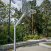 A broom in a basketball hoop