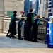 An Amish family watching the boats go by on the Chicago river.