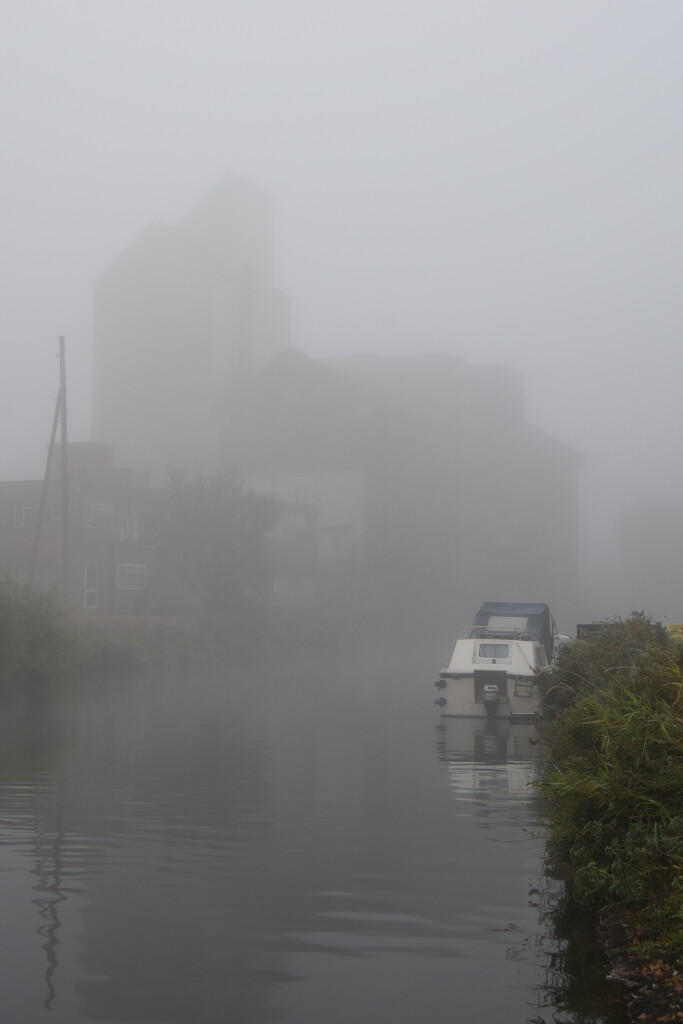 Boat in the mist by dragey74