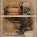 Plates in the Cupboard