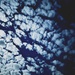 Behind the clouds