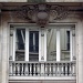 The window in front of the bus stop by parisouailleurs