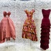 Three evening dresses. 